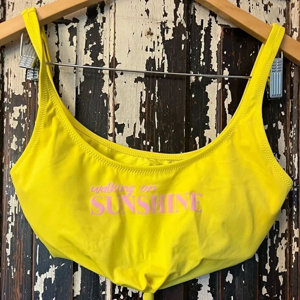 Women’s super cute Coco Rave walking on Sunshine bright swim top. Size small.